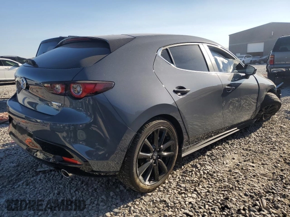 2024 Mazda 3 S Carbon Edition with VIN JM1BPBLM4R1714705, listed as a Copart auction lot 69140474 with 1,808 mi miles and Salvage Title. Bid and sale history available at DreamBid. Image 3.