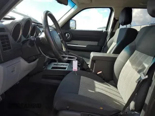 2010 Dodge Nitro SXT z VIN 1D4PT5GK2AW131913, wystawiony jako Copart lot #42711015 z przebiegiem 177 637 mil mil oraz Szkoda całkowita • Salvage title. Historia ofert i sprzedaży dostępna na DreamBid. Obrazek 7.