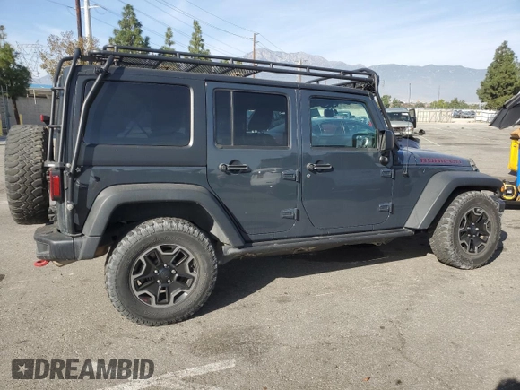 2017 Jeep Wrangler Unlimited Rubicon Recon with VIN 1C4BJWFG4HL533413, listed as a Copart auction lot 86196194 with 39,162 mi miles and Salvage title. Bid and sale history available at DreamBid. Image 3.