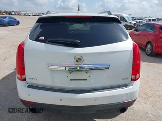 2012 Cadillac SRX Premium Collection with VIN 3GYFNCE38CS517912, listed as a IAAI auction lot 42435672 with 193,103 mi miles and . Bid and sale history available at DreamBid. Image 16.