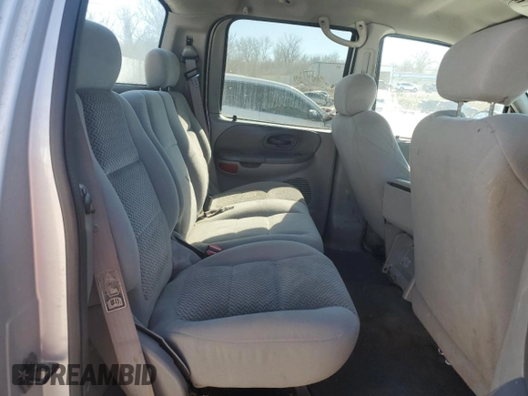 2003 Ford F-150 XLT with VIN 1FTRW08L03KD74119, listed as a Copart auction lot 47373105 with 303,513 mi miles and Salvage Title. Bid and sale history available at carsss.com. Image 11.
