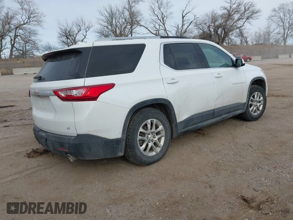 2018 Chevrolet Traverse LT Cloth z VIN 1GNEVGKW8JJ167095, wystawiony jako IAAI lot #41479356 z przebiegiem 98 615 mil mil oraz . Historia ofert i sprzedaży dostępna na DreamBid. Obrazek 4.
