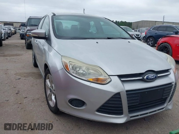 2014 Ford Focus SE with VIN 1FADP3F21EL354774, listed as a IAAI auction lot 41972701 with 115,046 mi miles. Bid and sale history available at carsss.com. Image 1.