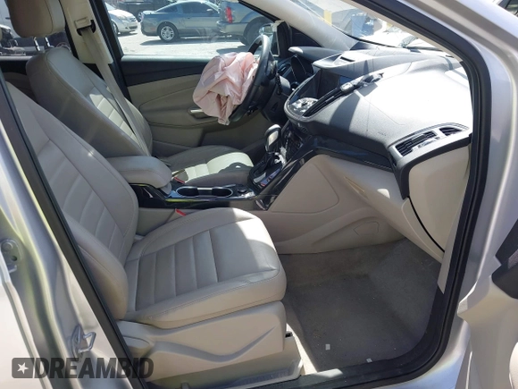 2014 Ford Escape Titanium с VIN 1FMCU0J9XEUB93591, выставлен на аукционе IAAI как лот 41721869 с пробегом 98 859 миль миль и . История ставок и продаж доступна на DreamBid. Изображение 5.