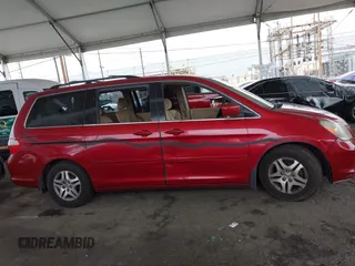 2005 Honda Odyssey EX with VIN 5FNRL38485B411954, listed as a IAAI auction lot 42039034 with 220,966 mi miles. Bid and sale history available at carsss.com. Image 13.