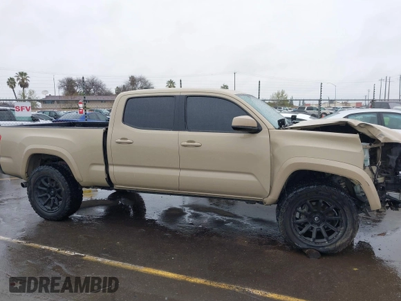 2016 Toyota Tacoma SR5 with VIN 3TMDZ5BN3GM003351, listed as a IAAI auction lot 41721932 with 100,774 mi miles and . Bid and sale history available at DreamBid. Image 14.