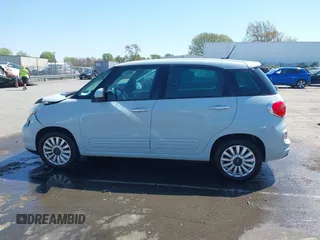 2015 FIAT 500L Easy with VIN ZFBCFABH8FZ031234, listed as a IAAI auction lot 41870102 with 86,267 mi miles and . Bid and sale history available at DreamBid. Image 14.