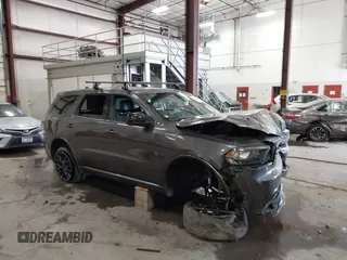 2015 Dodge Durango SXT with VIN 1C4RDJAG0FC111894, listed as a IAAI auction lot 42647506 with 94,503 mi miles and . Bid and sale history available at DreamBid. Image 1.