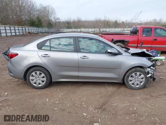 2023 Kia Rio LX z VIN 3KPA24AD7PE520723, wystawiony jako IAAI lot #41184281 z przebiegiem 11 971 mil mil oraz . Historia ofert i sprzedaży dostępna na DreamBid. Obrazek 13.