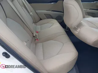 2019 Toyota Camry LE with VIN 4T1B11HK2KU743445, listed as a IAAI auction lot 42129688 with 284,938 mi miles and . Bid and sale history available at DreamBid. Image 8.