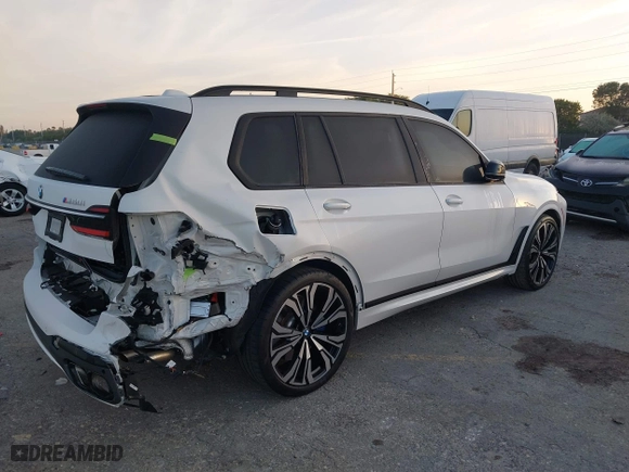 2024 BMW X7 M60i with VIN 5UX33EM06R9S83619, listed as a IAAI auction lot 41444610 with 29,509 mi miles. Bid and sale history available at carsss.com. Image 4.