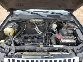 2009 Mercury Mariner Premier z VIN 4M2CU87749KJ12895, wystawiony jako Copart lot #44384555 z przebiegiem 278 370 mil mil oraz Tytuł czysty. Historia ofert i sprzedaży dostępna na DreamBid. Obrazek 12.