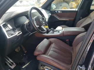 2021 BMW X5 z VIN NJ1541E, wystawiony jako Copart lot #37990264 z przebiegiem 18 321 mil mil oraz Szkoda całkowita • Salvage title. Historia ofert i sprzedaży dostępna na DreamBid. Obrazek 7.