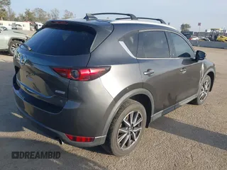 2018 Mazda CX-5 Grand Touring with VIN JM3KFBDM0J0405574, listed as a IAAI auction lot 41725319 with 44,380 mi miles. Bid and sale history available at carsss.com. Image 4.