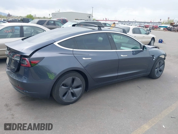 2020 Tesla Model 3 Long Range with VIN 5YJ3E1EB1LF639055, listed as a IAAI auction lot 42048009 with 43,493 mi miles. Bid and sale history available at carsss.com. Image 4.