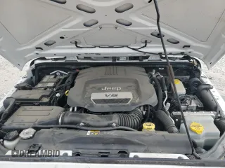 2018 Jeep Wrangler JK Unlimited Sport S with VIN 1C4BJWDGXJL898946, listed as a Copart auction lot 77688334 with 34,179 mi miles and Salvage Title. Bid and sale history available at carsss.com. Image 11.