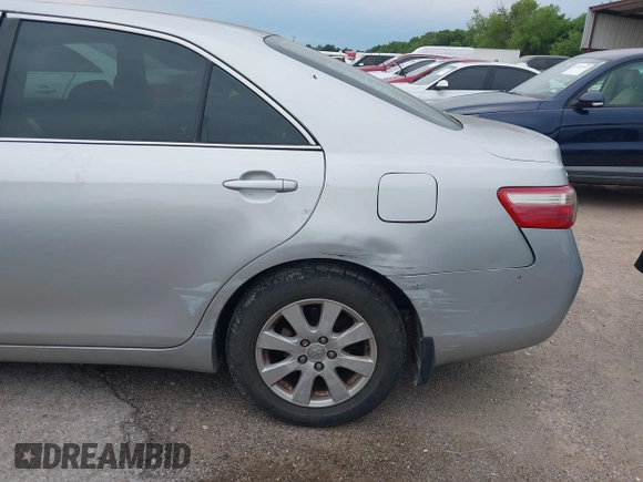 2007 Toyota Camry CE with VIN 4T1BE46K97U571446, listed as a IAAI auction lot 42195858 with 222,159 mi miles and . Bid and sale history available at DreamBid. Image 6.