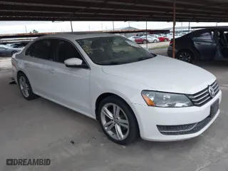 2014 Volkswagen Passat SE w/Sunroof with VIN 1VWBS7A31EC081968, listed as a IAAI auction lot 41963985 with 143,670 mi miles. Bid and sale history available at carsss.com. Image 1.