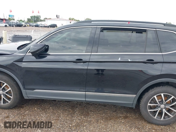 2021 Volkswagen Tiguan SE z VIN 3VV3B7AX7MM004286, wystawiony jako IAAI lot #39864219 z przebiegiem 67 429 mil mil oraz . Historia ofert i sprzedaży dostępna na DreamBid. Obrazek 14.