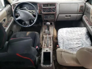 1999 Mitsubishi Montero Limited z VIN JA4LS41R5XP007663, wystawiony jako Copart lot #84892924 z przebiegiem Nie podano mil oraz Czysty tytuł • Clean title. Historia ofert i sprzedaży dostępna na DreamBid. Obrazek 8.