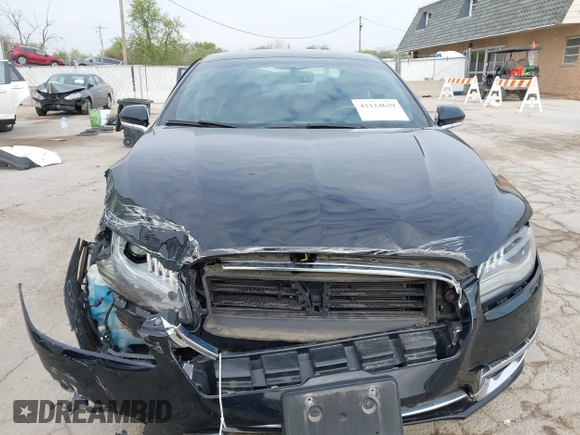 2017 Lincoln MKZ Hybrid Premiere z VIN 3LN6L5KU6HR622317, wystawiony jako IAAI lot #42124629 z przebiegiem 62 674 mil mil oraz . Historia ofert i sprzedaży dostępna na DreamBid. Obrazek 13.