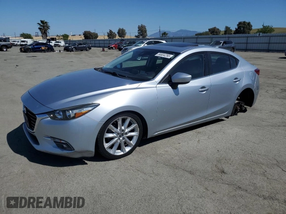 2017 Mazda 3 Grand Touring z VIN 3MZBN1W37HM141705, wystawiony jako Copart lot #56604255 z przebiegiem 62 308 mil mil oraz Szkoda całkowita • Salvage title. Historia ofert i sprzedaży dostępna na DreamBid. Obrazek 1.