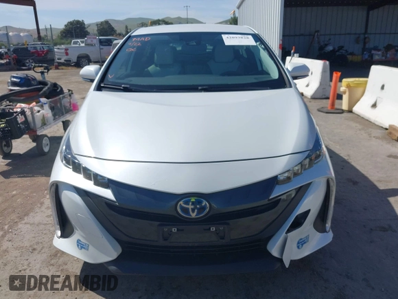 2021 Toyota Prius LE with VIN JTDKAMFP2M3177459, listed as a IAAI auction lot 42093828 with 65,501 mi miles and . Bid and sale history available at DreamBid. Image 12.