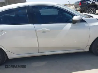 2019 Honda Civic Sedan LX with VIN 19XFC2F64KE040214, listed as a IAAI auction lot 41753300 with 74,285 mi miles. Bid and sale history available at carsss.com. Image 14.