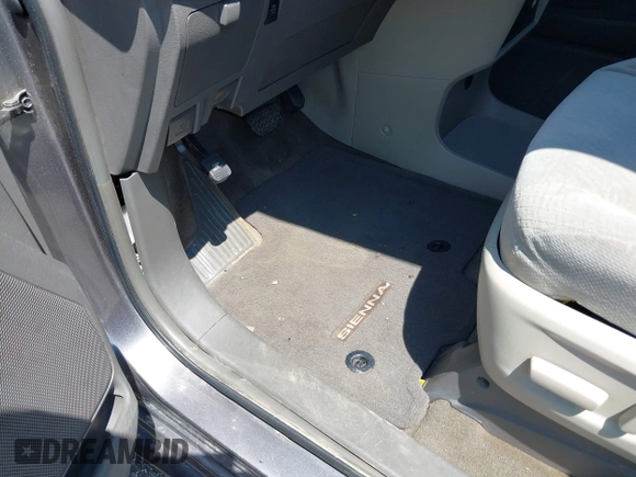2015 Toyota Sienna LE AAS with VIN 5TDKK3DC4FS617903, listed as a IAAI auction lot 42390155 with 151,975 mi miles and . Bid and sale history available at DreamBid. Image 6.