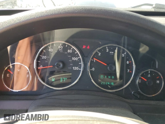 2010 Jeep Liberty Sport with VIN 1J4PP2GK5AW140857, listed as a Copart auction lot 46137715 with 203,416 mi miles and Clean Title. Bid and sale history available at DreamBid. Image 9.