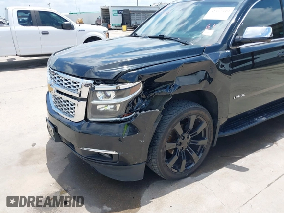 2015 Chevrolet Tahoe with VIN 1GNSK2KC4FR610534, listed as a IAAI auction lot 42357319 with 140,479 mi miles and . Bid and sale history available at DreamBid. Image 6.
