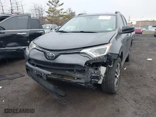 2018 Toyota RAV4 LE with VIN JTMBFREV0JJ223957, listed as a IAAI auction lot 41652810 with 144,629 mi miles. Bid and sale history available at carsss.com. Image 6.