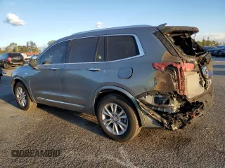2024 Cadillac XT6 FWD Luxury with VIN 1GYKPAR40RZ744121, listed as a Copart auction lot 86413604 with 7,527 mi miles and Salvage Title. Bid and sale history available at carsss.com. Image 2.