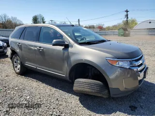2014 Ford Edge SEL z VIN 2FMDK4JC7EBA36345, wystawiony jako Copart lot #53434145 z przebiegiem 184 955 mil mil oraz Szkoda całkowita • Salvage title. Historia ofert i sprzedaży dostępna na DreamBid. Obrazek 4.