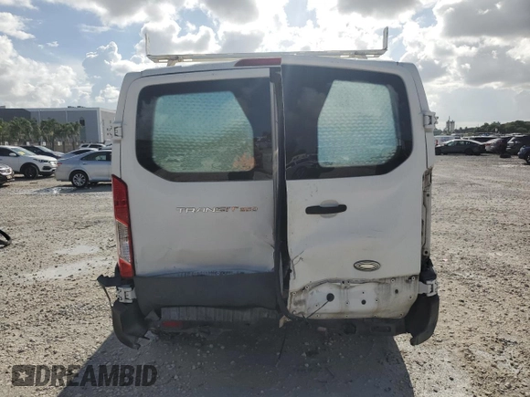 2015 Ford Transit Cargo with VIN 1FTNR1ZM8FKA33669, listed as a Copart auction lot 63588345 with 86,260 mi miles and Salvage title. Bid and sale history available at DreamBid. Image 6.