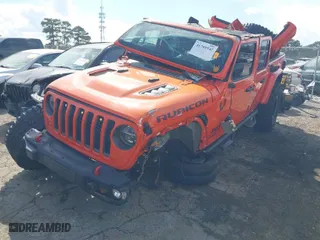 2020 Jeep Gladiator Rubicon with VIN 1C6JJTBG0LL164890, listed as a IAAI auction lot 41795545 with 77,860 mi miles. Bid and sale history available at carsss.com. Image 2.