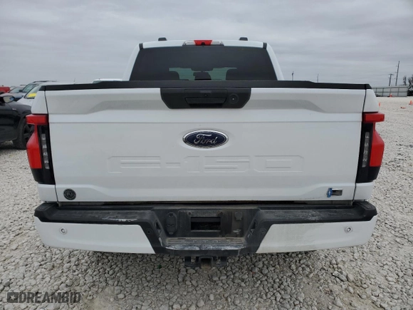 2023 Ford F-150 Lightning Pro with VIN 1FTVW1EL5PWG29760, listed as a Copart auction lot 41504105 with 22,870 mi miles and Salvage Title. Bid and sale history available at carsss.com. Image 6.