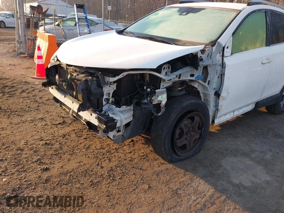 2017 Toyota RAV4 LE with VIN JTMZFREV7HJ120317, listed as a IAAI auction lot 41166489 with 144,799 mi miles and . Bid and sale history available at carsss.com. Image 6.