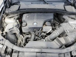 2015 BMW X1 sDrive28i z VIN WBAVM1C55FV317854, wystawiony jako Copart lot #52201705 z przebiegiem 86 015 mil mil oraz Szkoda całkowita • Salvage title. Historia ofert i sprzedaży dostępna na DreamBid. Obrazek 12.