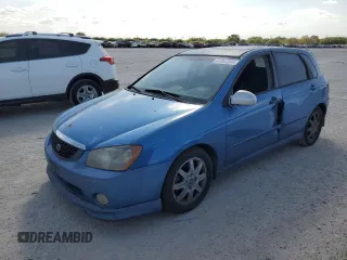 2005 Kia Spectra with VIN KNAFE161555082073, listed as a Copart auction lot 77062804 with 173,387 mi miles and Salvage Title. Bid and sale history available at carsss.com. Image 1.