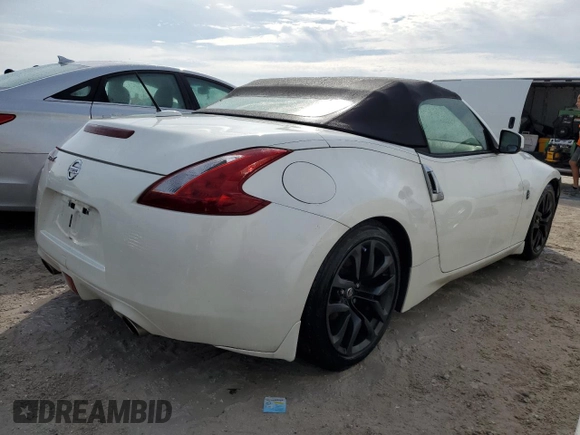 2014 Nissan 370Z Touring with VIN JN1AZ4FH8EM621259, listed as a Copart auction lot 77571454 with Not Provided miles and Salvage Title. Bid and sale history available at DreamBid. Image 3.