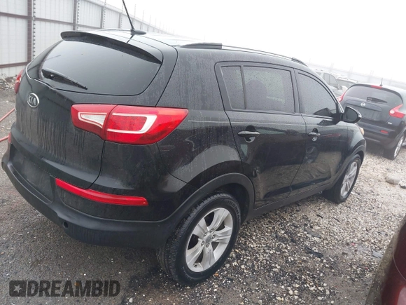 2011 Kia Sportage LX with VIN KNDPB3A25B7027733, listed as a IAAI auction lot 38570270 with 186,271 mi miles and . Bid and sale history available at carsss.com. Image 4.