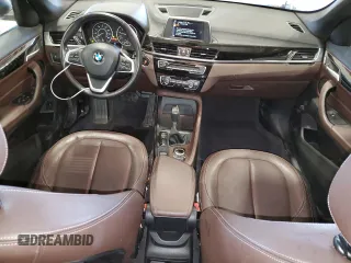 2017 BMW X1 xDrive28i with VIN WBXHT3C36H5F76388, listed as a Copart auction lot 48435305 with 51,841 mi miles and Salvage title. Bid and sale history available at DreamBid. Image 8.