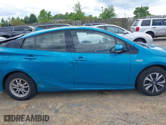 2017 Toyota Prius Plus z VIN JTDKARFP4H3067953, wystawiony jako IAAI lot #42211132 z przebiegiem 90 760 mil mil oraz . Historia ofert i sprzedaży dostępna na DreamBid. Obrazek 13.