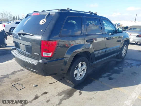 2005 Jeep Grand Cherokee Laredo with VIN 1J8GS48K95C615330, listed as a IAAI auction lot 41719101 with 152,186 mi miles. Bid and sale history available at carsss.com. Image 4.
