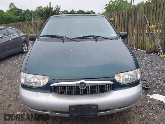 2000 Mercury Villager z VIN 4M2XV11T3YDJ28665, wystawiony jako IAAI lot #42251462 z przebiegiem 113 809 mil mil oraz . Historia ofert i sprzedaży dostępna na DreamBid. Obrazek 6.