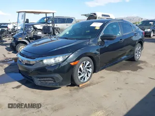 2018 Honda Civic EX with VIN 19XFC2F74JE021802, listed as a IAAI auction lot 42031745 with 102,986 mi miles and . Bid and sale history available at DreamBid. Image 2.