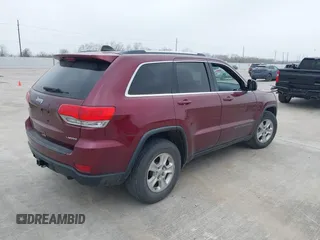 2017 Jeep Grand Cherokee Laredo with VIN 1C4RJEAG5HC780326, listed as a IAAI auction lot 41743223 with 73,675 mi miles. Bid and sale history available at carsss.com. Image 4.