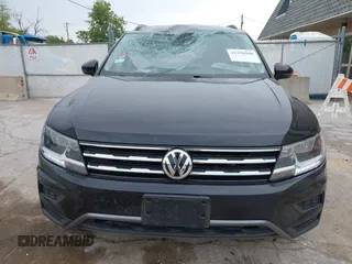 2021 Volkswagen Tiguan SE z VIN 3VV3B7AXXMM101773, wystawiony jako IAAI lot #42358588 z przebiegiem 105 629 mil mil oraz . Historia ofert i sprzedaży dostępna na DreamBid. Obrazek 13.
