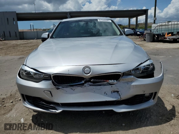 2013 BMW 3 Series 328i with VIN WBA3C1G52DNR49440, listed as a Copart auction lot 61546685 with 118,308 mi miles and Salvage title. Bid and sale history available at DreamBid. Image 5.